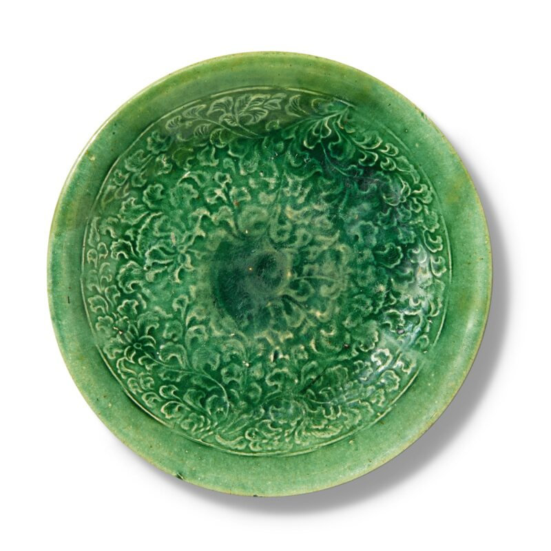 A molded green-glazed dish, Liao dynasty