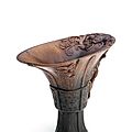 A rare archaistic rhinoceros horn libation cup, 18th century