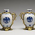 Pair of blue and white jars with three peonies and symbols. porcelain: kangxi period,1675-1725; mounts: mid 18th century