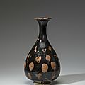 A Northern Black Glazed Russet Splashed Pear-Shaped Vase, Yuhuchunping
