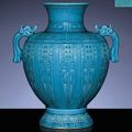 A rare carved and moulded turquoise-glazed archaistic baluster vase. qianlong incised six-character sealmark and of the period 