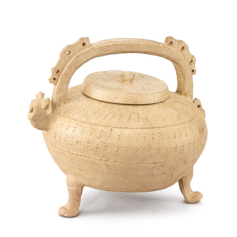 A celadon-glazed handled tripod jar and cover, Han dynasty (218 BC-220 AD)