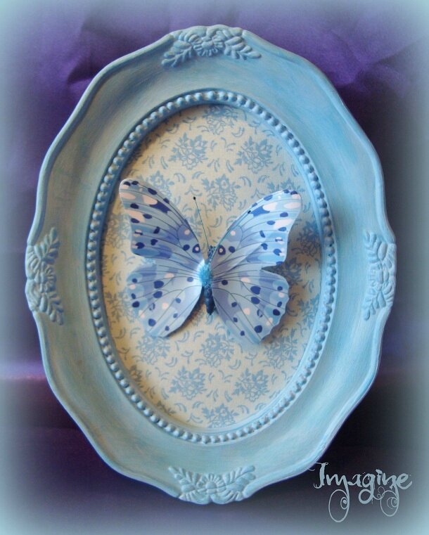 cadre papillon bleu