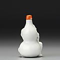A moulded white porcelain 'boy and double-gourd' snuff bottle, qing dynasty, 18th-19th century  