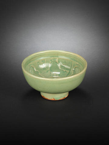 A celadon-glazed moulded bowl, 14th-15th century