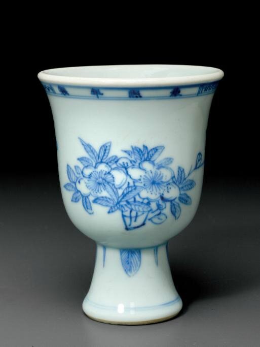 A blue and white stem cup,Kangxi four-character mark in underglaze blue in a line and of the period (1662-1722)