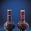 A rare pair of ruby-red-overlay snowflake glass bottle vases, Qing dynasty, 18th-19th century