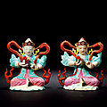 A pair of famille-rose ‘ministers’ altar ornaments, qing dynasty, qianlong period