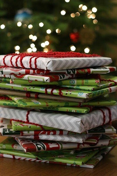 wrap up twenty-five children's books and put them under the tree with a special blanket next to them Before bed each evening