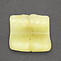 A pale yellow jade 'double cicada', probably neolithic period, hongshan culture (c. 3800-2700 bc)