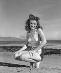 1945_beach_sitting_bikini_mmad166