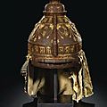 An extremely rare imperial parcel-gilt iron helmet. qing dynasty, qianlong period