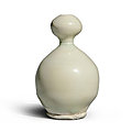 A rare white-glazed double-gourd vase, Tang dynasty (618-907)
