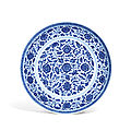A ming-style blue and white ‘floral scroll’ dish, yongzheng six-character mark and of the period (1723-1735)