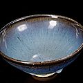 A large conical stoneware bowl with thick, blue glaze, junyao ware, yuan or early ming dynasty