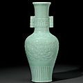A rare celadon-glazed relief-decorated baluster vase, qianlong six-character seal mark in underglaze blue and of the period