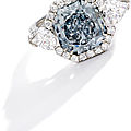 An important fancy intense blue diamond and diamond ring