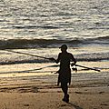 Coucher de soleil avec pêcheurs à annoville-plage (manche) le 18 août 2015 (1)