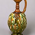 Three-color glazed phoenix-head ewer with applied ornaments, Tang Dynasty, 8th century