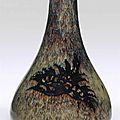 An extremely rare paper-cut resist-decorated Jizhou bottle vase, Southern Song dynasty (1127-1279)