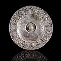 A rare repoussé-silver offering dish on stand deporated with lotus petals and a cham inscription, vietnam, champa, 13th-14th ct