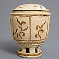 A Vietnamese jar and cover on reticulated stand, Trần dynasty, 13th-15th century