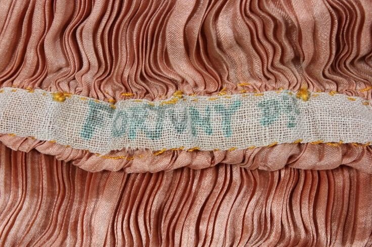 A Mariano Fortuny copper silk Delphos gown, circa 1920-30 6