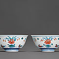 A fine pair of doucai 'mandarin duck and lotus' bowls, qianlong six-character seal mark and of the period (1736-1795)