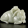 A very rare pale green jade 'ram and boy' group, 18th century