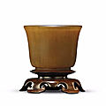 A rare small rhinoceros horn wine cup, Ming dynasty, early 17th century