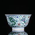 A fine and very rare imperial doucai dragon and phoenix bowl, underglaze blue kangxi six-character mark and period