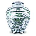 A green-enamelled 'dragon' jar and cover ; jar: mark and period of kangxi ; cover: qing dynasty, qianlong period 