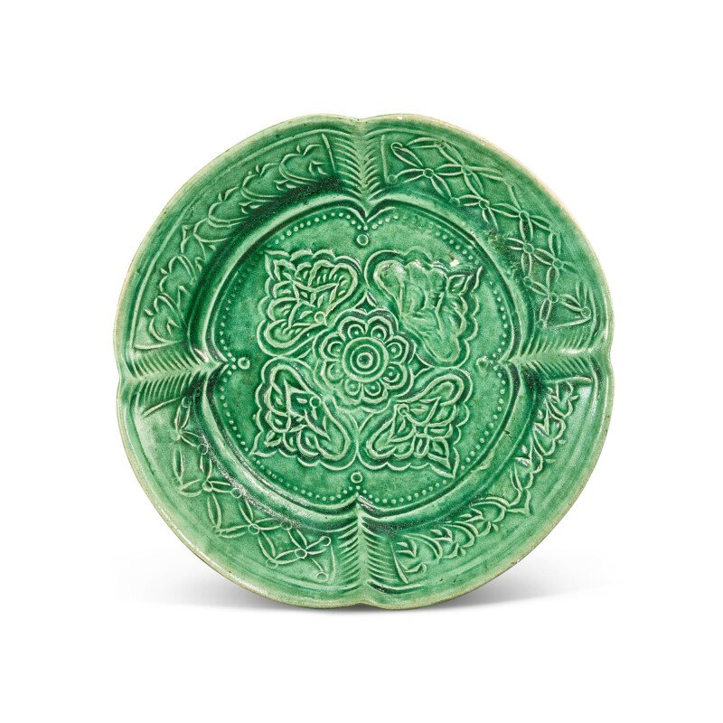 A moulded green-glazed pottery dish, Liao dynasty