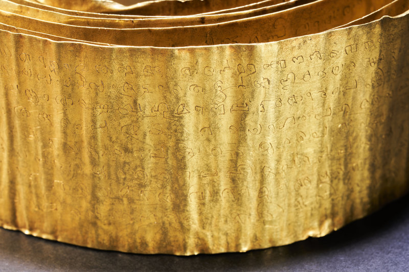 Treaty between Calicut and the Dutch showing the Malayalam text inscribed on a strip of gold over two metres long India 1691
