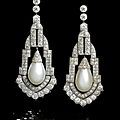 A pair of art deco natural pearl and diamond pendent earrings, circa 1925
