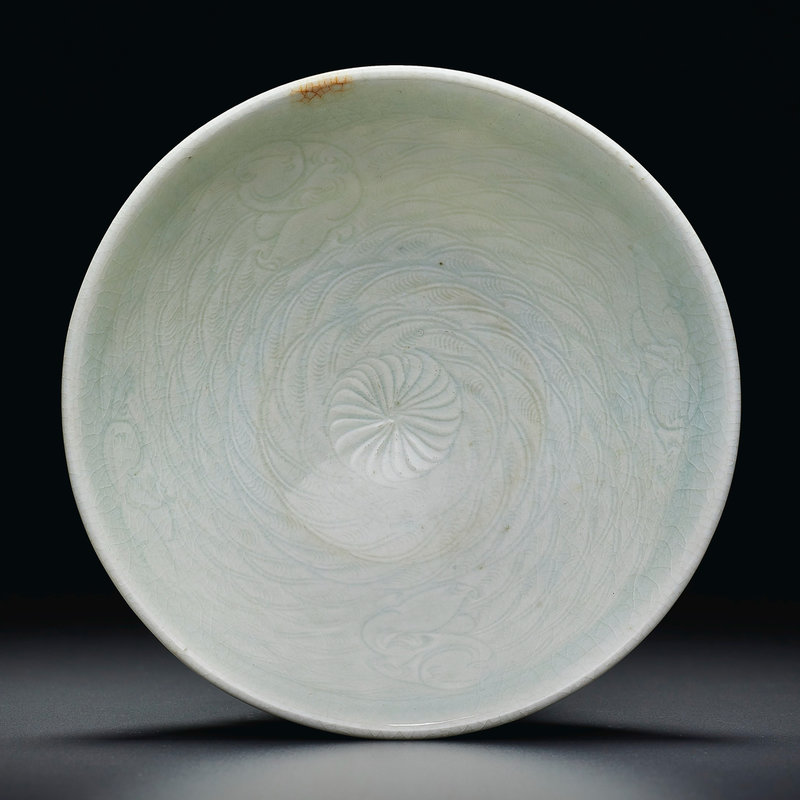A carved Qingbai 'boys' bowl, Southern Song dynasty (1127-1279)