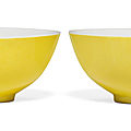 A pair of lemon yellow-enamelled wine cups, yongzheng six-character marks in underglaze blue within a double circle and of the