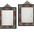 A pair of italian baroque ebonised, tortoiseshell and silver mounted mirrors, 18th ct