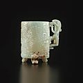 An archaistic pale celadon jade cup, 17th century