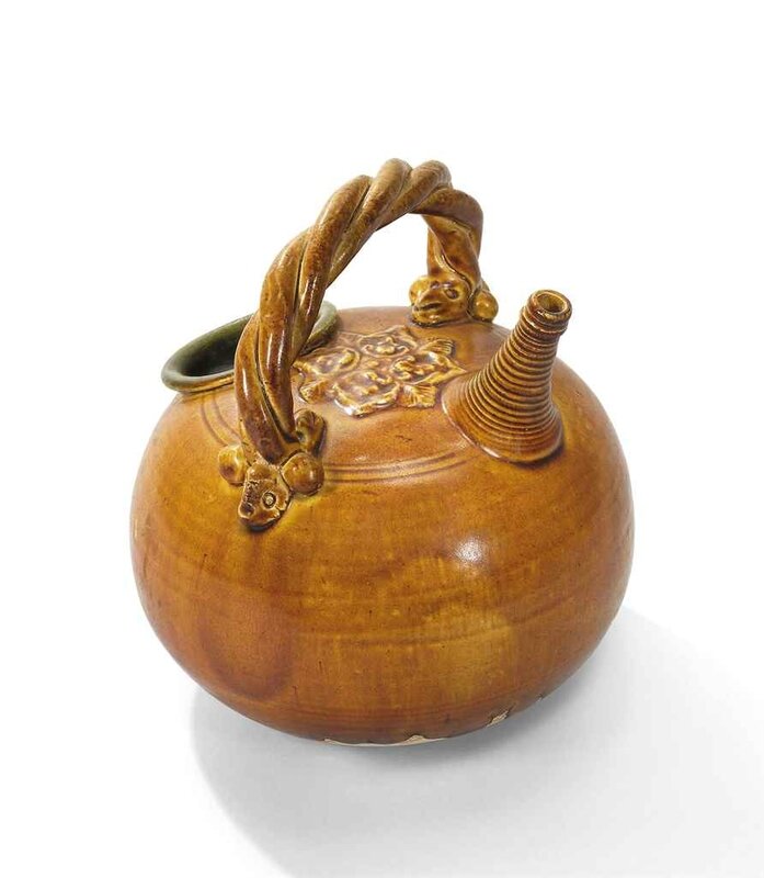 A rare amber and green-glazed ewer, Liao dynasty (608-1210)