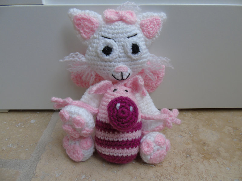 aristrochat au crochet et cochon au crochet rose