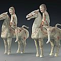 A pair of painted grey pottery figures of horses and riders, china, han dynasty (206 bc-ad 220)