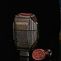 A fine carved rhinoceros seal set in shape of a flask, China, 18th-19th ct © 2010 Nagel - Auctions