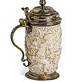 A small carved ivory and silvergilt tankard, late 19th ct