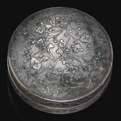 A small circular silver box and cover, Tang dynasty (618-907)
