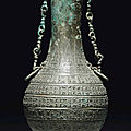 A bronze ritual wine vessel and cover, hu, late spring and autumn period, late 6th-5th century bc