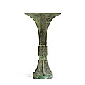 An inscribed archaic bronze ritual wine vessel, gu, shang dynasty (c. 1500-1050 bc)