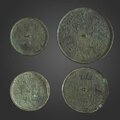 A group of four early bronze mirrors, Warring States period