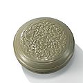 A rare carved yue ‘parrot and peony’ circular box and cover, northern song dynasty (960-1127)