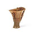 A very rare archaistic rhinoceros horn libation cup, by Hu Xingyue, incised four-character mark, 17th-18th century